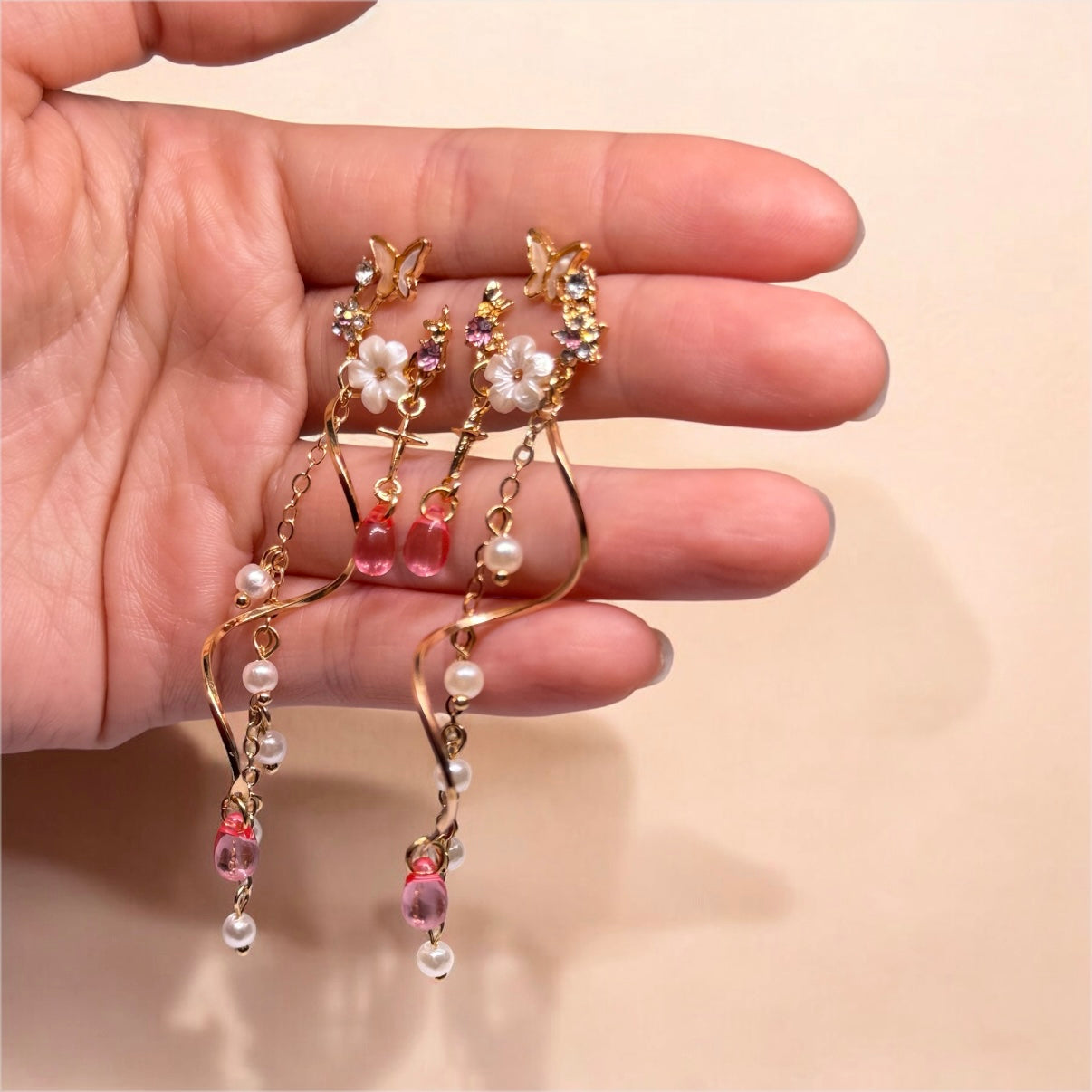 Whimsical - pink butterfly rhinestone flower earrings