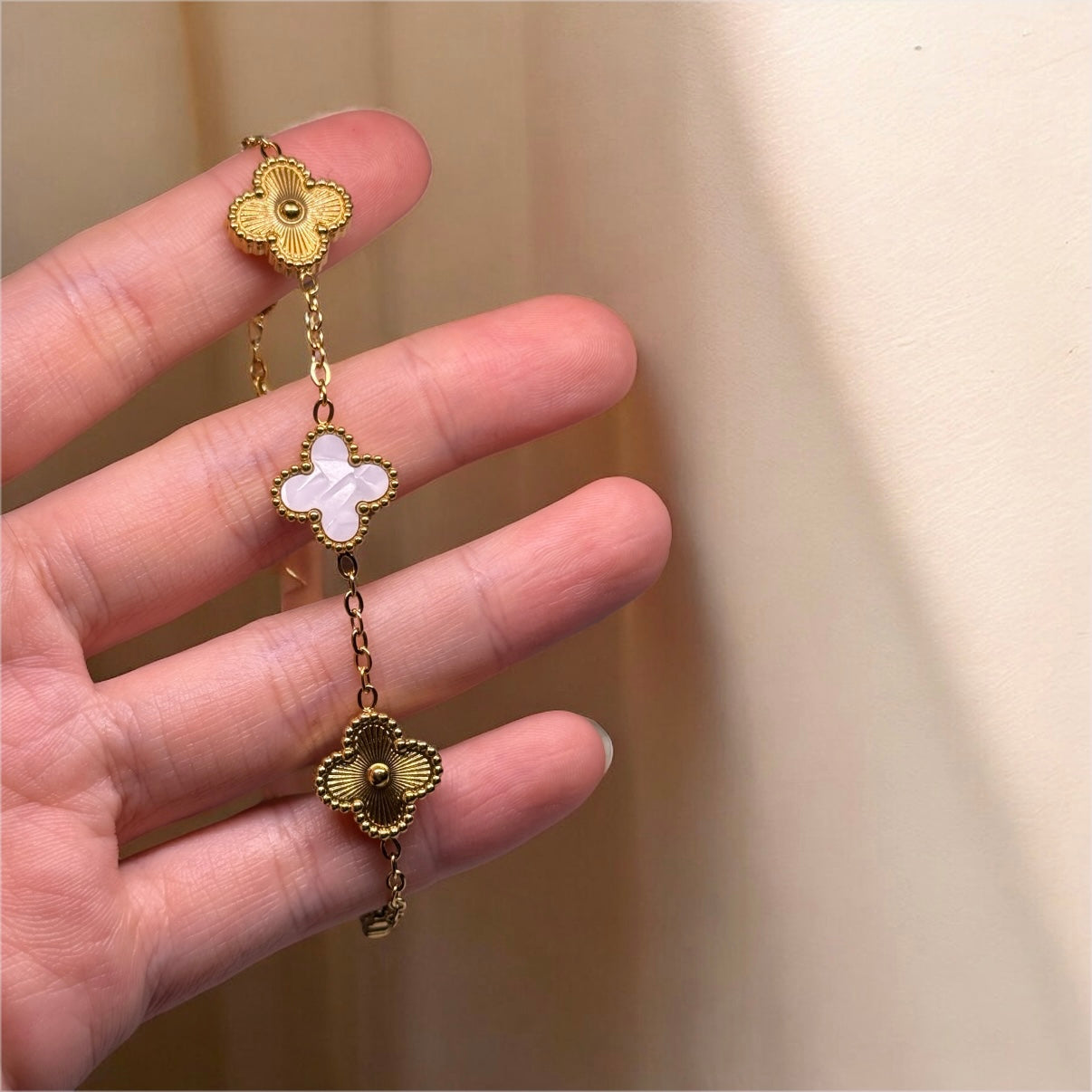 Golden bracelet with clover charm white and gold colour | stainless steel shinny decor bracelet
