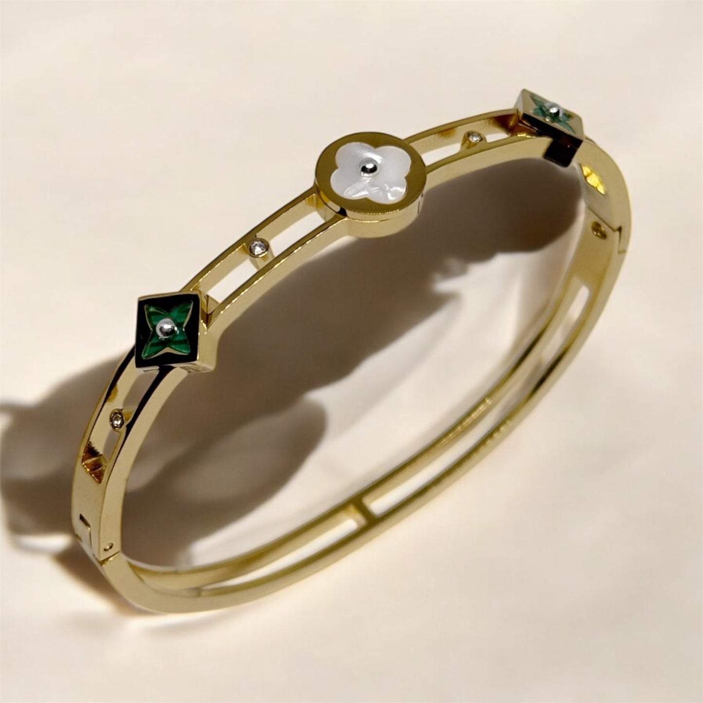 Gold bangle with green and white clover patterns | rhinestones embossed