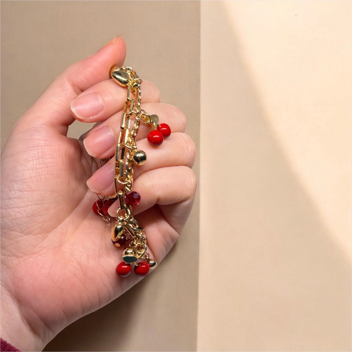 Golden chain bracelets with cherry and heart beads