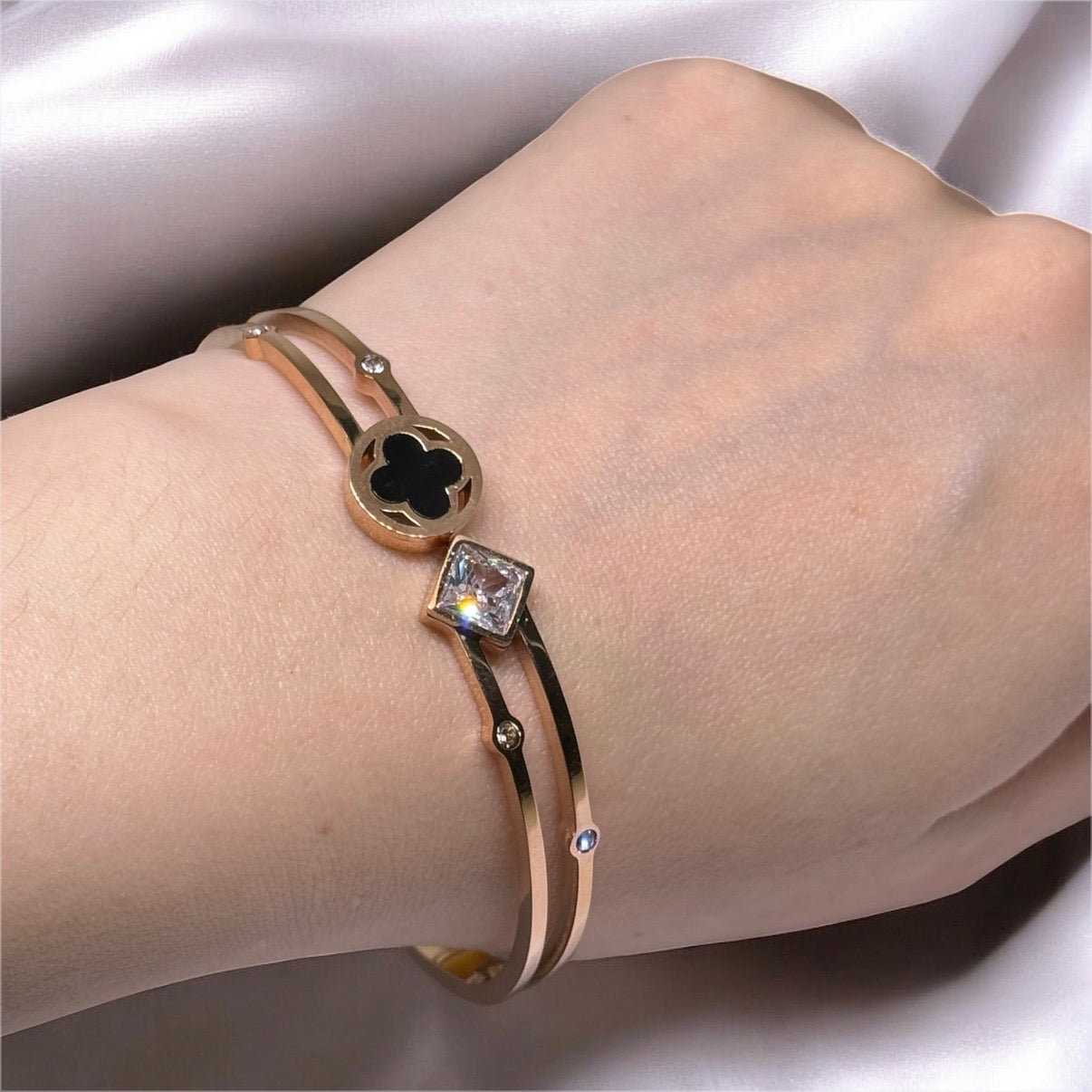 Rose Gold bangle with clover patterns | rhinestones embossed