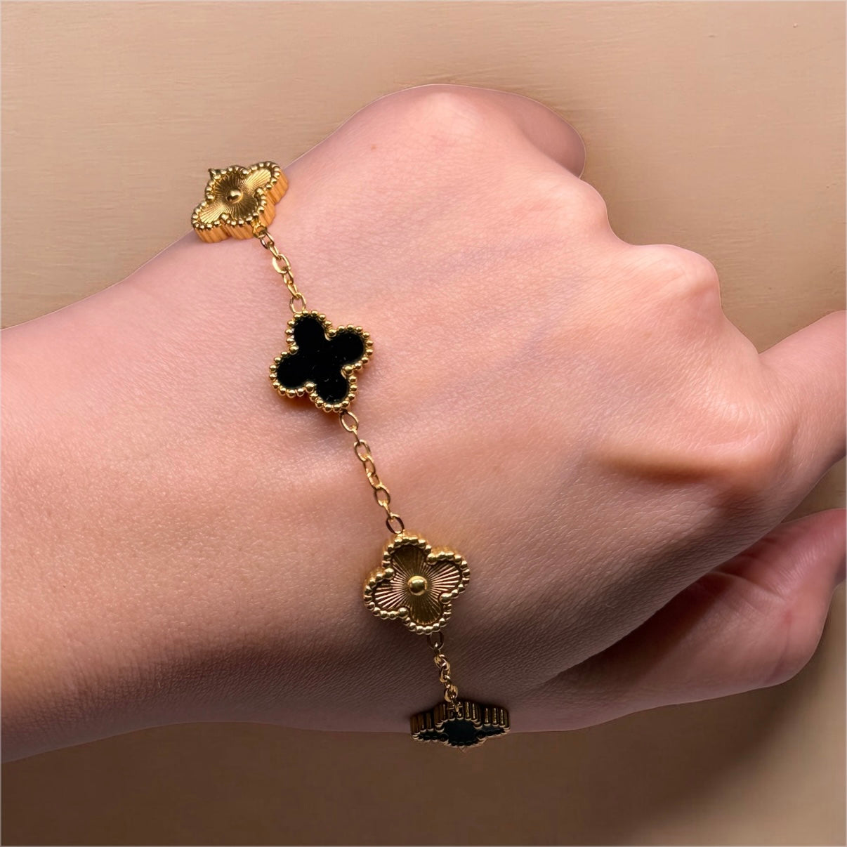 Golden bracelet with clover charm black and gold colour | stainless steel shinny decor bracelet