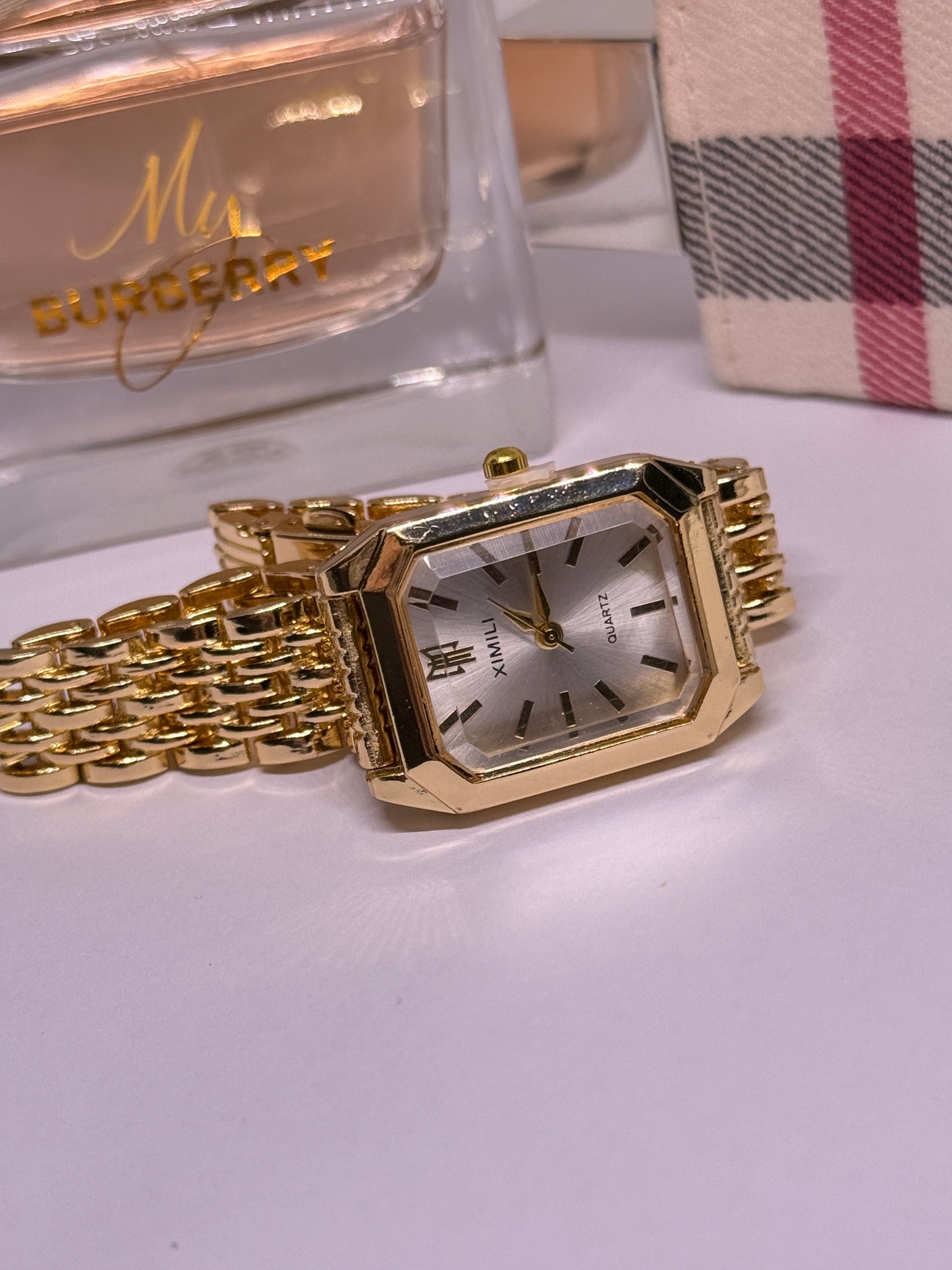 Golden tone women watch - white