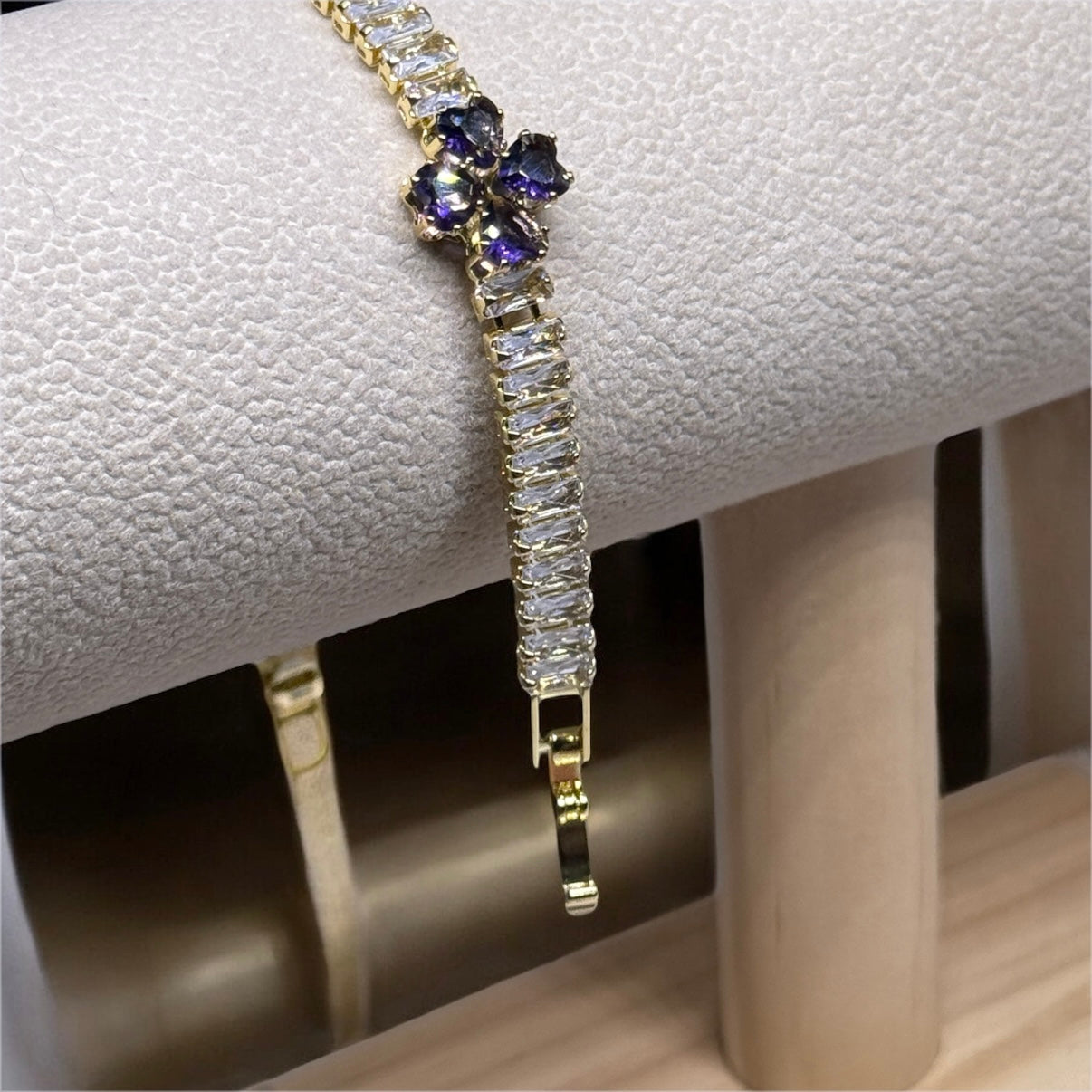 Gold bracelet with clover patterns | purple zircon embossed