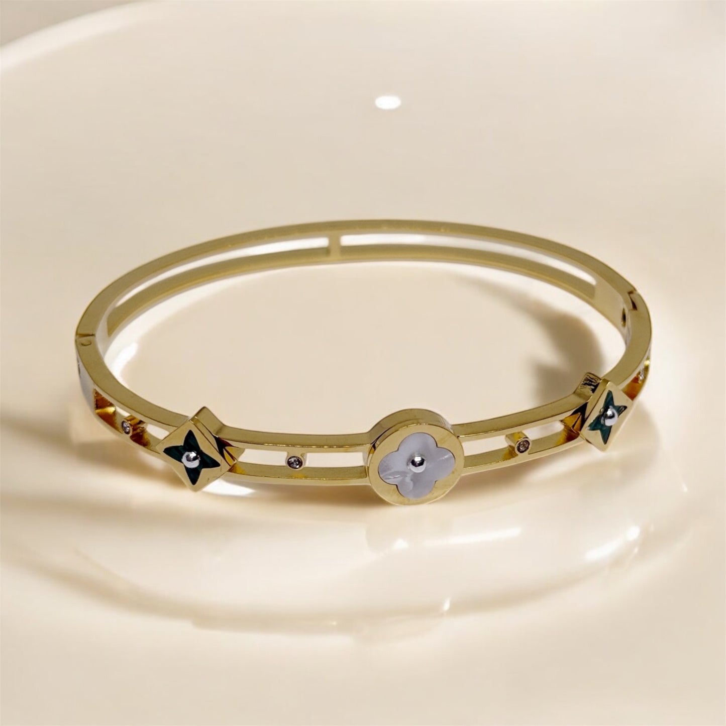 Gold bangle with green and white clover patterns | rhinestones embossed