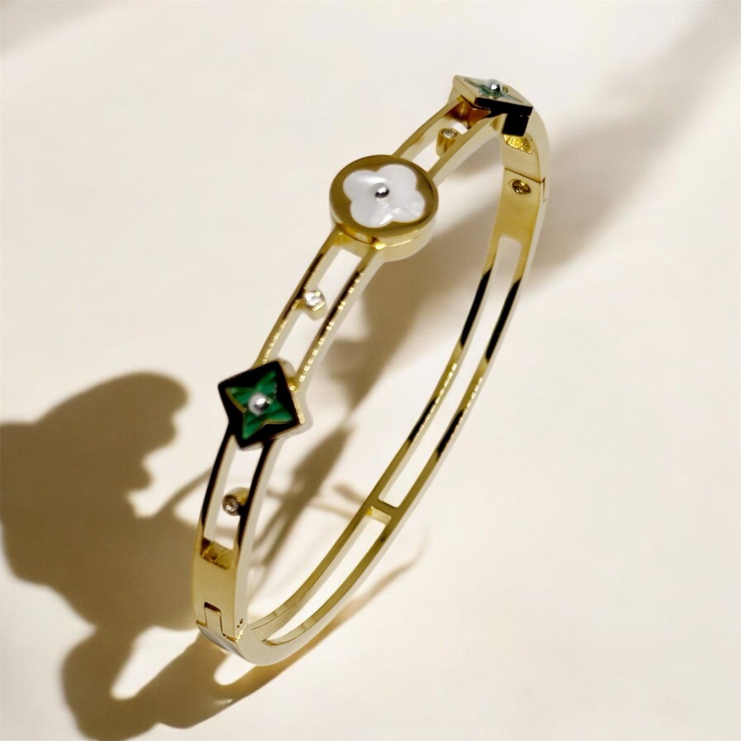 Gold bangle with green and white clover patterns | rhinestones embossed