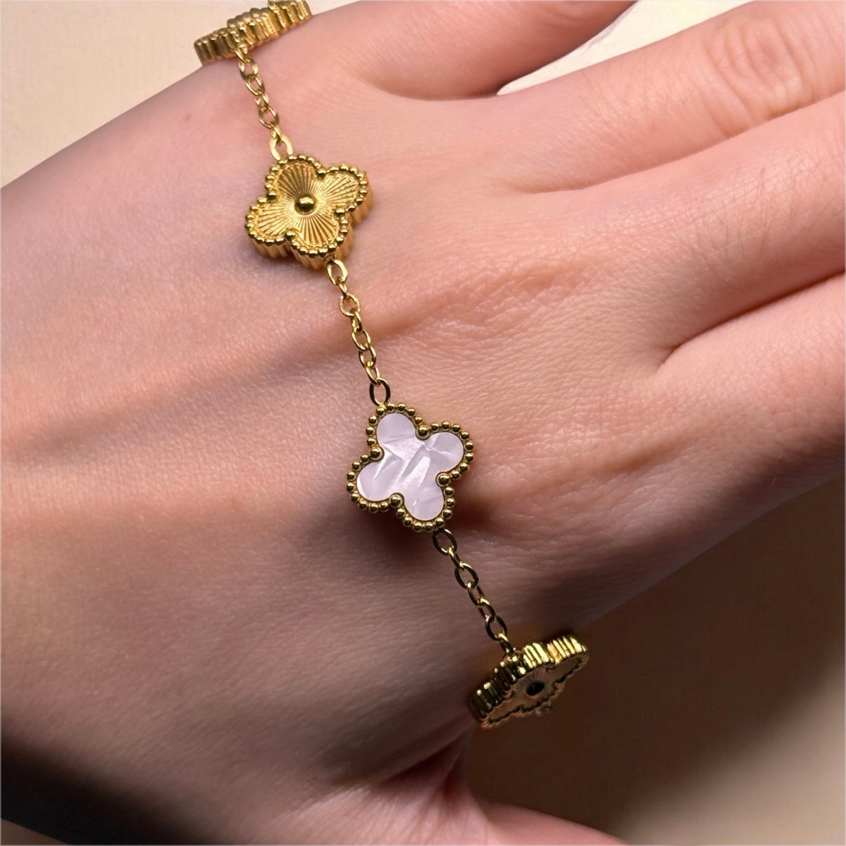 Golden bracelet with clover charm white and gold colour | stainless steel shinny decor bracelet