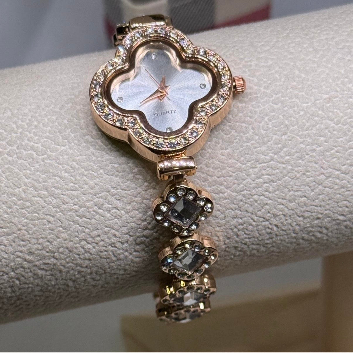 Golden clover shaped watch with clear rhinestone