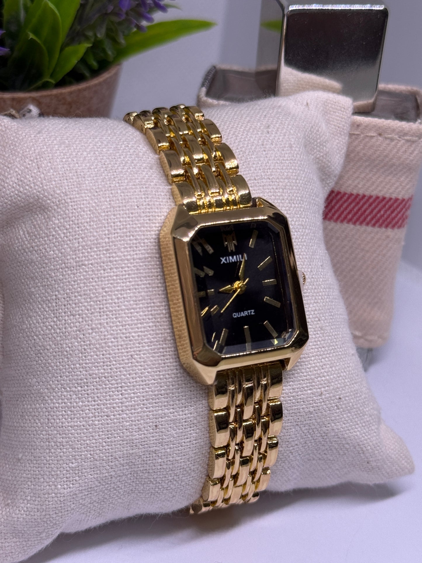 Golden tone women watch - black
