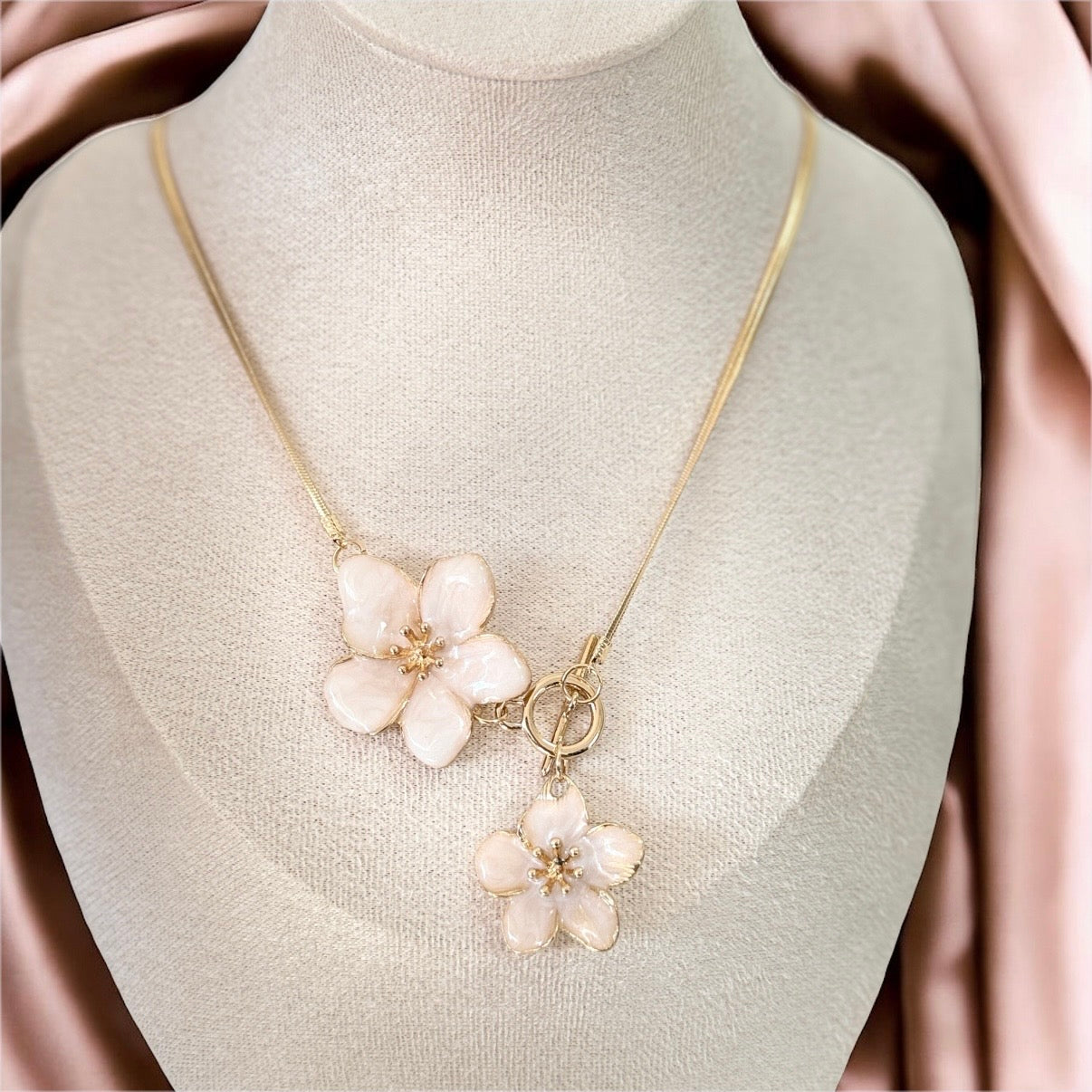 Gold tone flower pendant necklace with pearl flowers with gold chain and earrings set