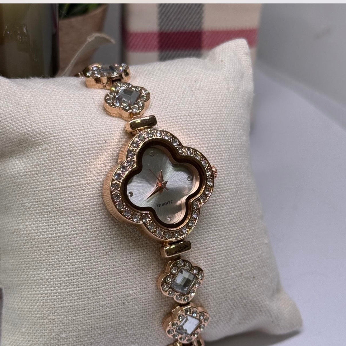 Golden clover shaped watch with clear rhinestone