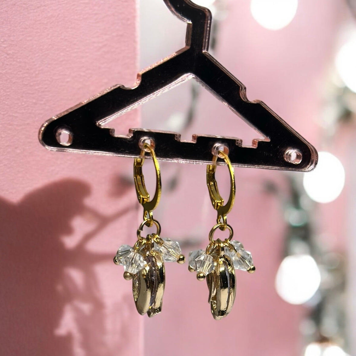 Golden flower dangle earrings with clear beads