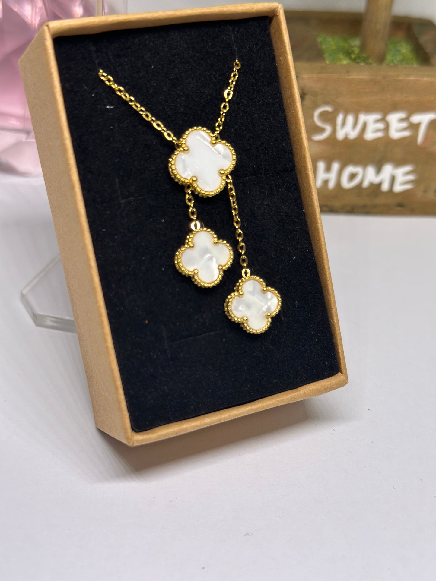 Golden clover necklaces