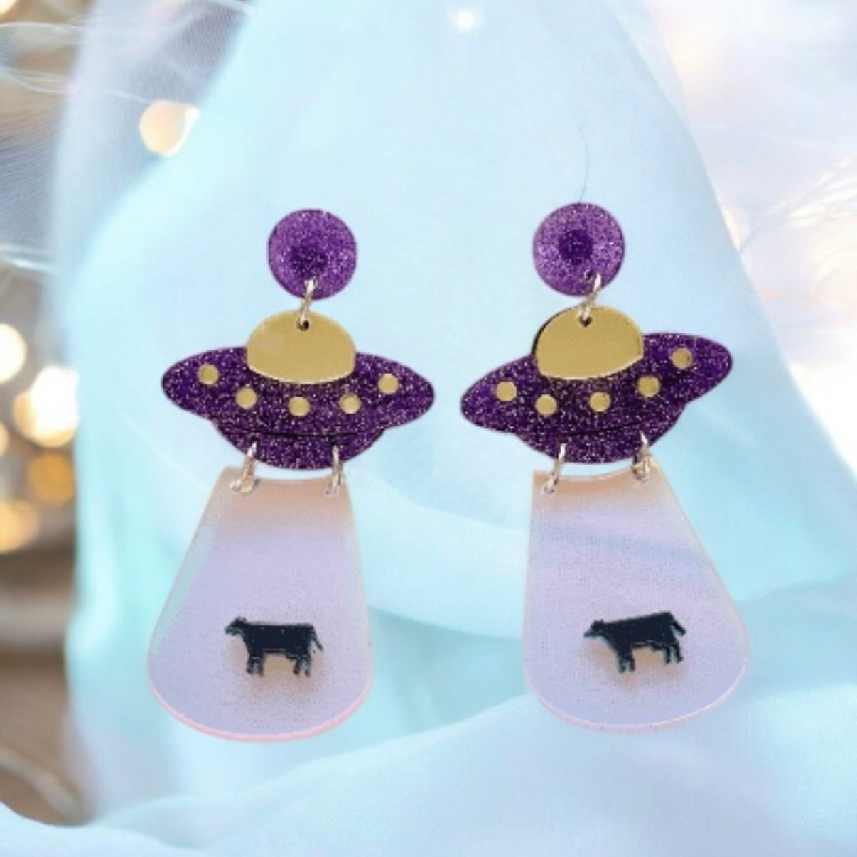 UFO cow earrings | hologram iridriscent earrings | quirky fun cute kawaii earrings | acrylic art earrings | scientific research mystery news