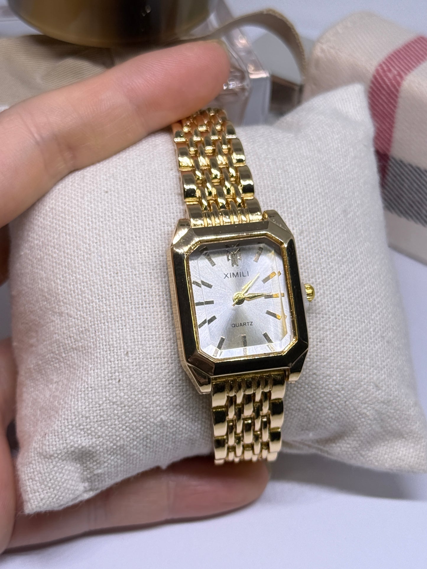 Golden tone women watch - white