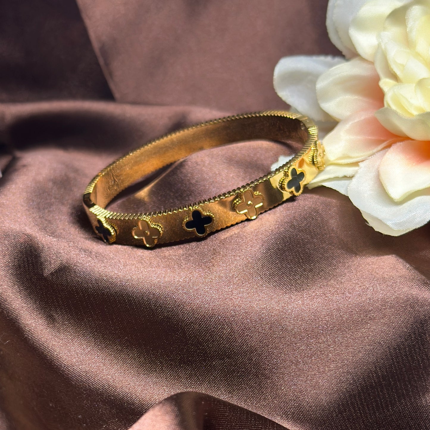 Gold bangle with black clover pattern | rhinestones embossed