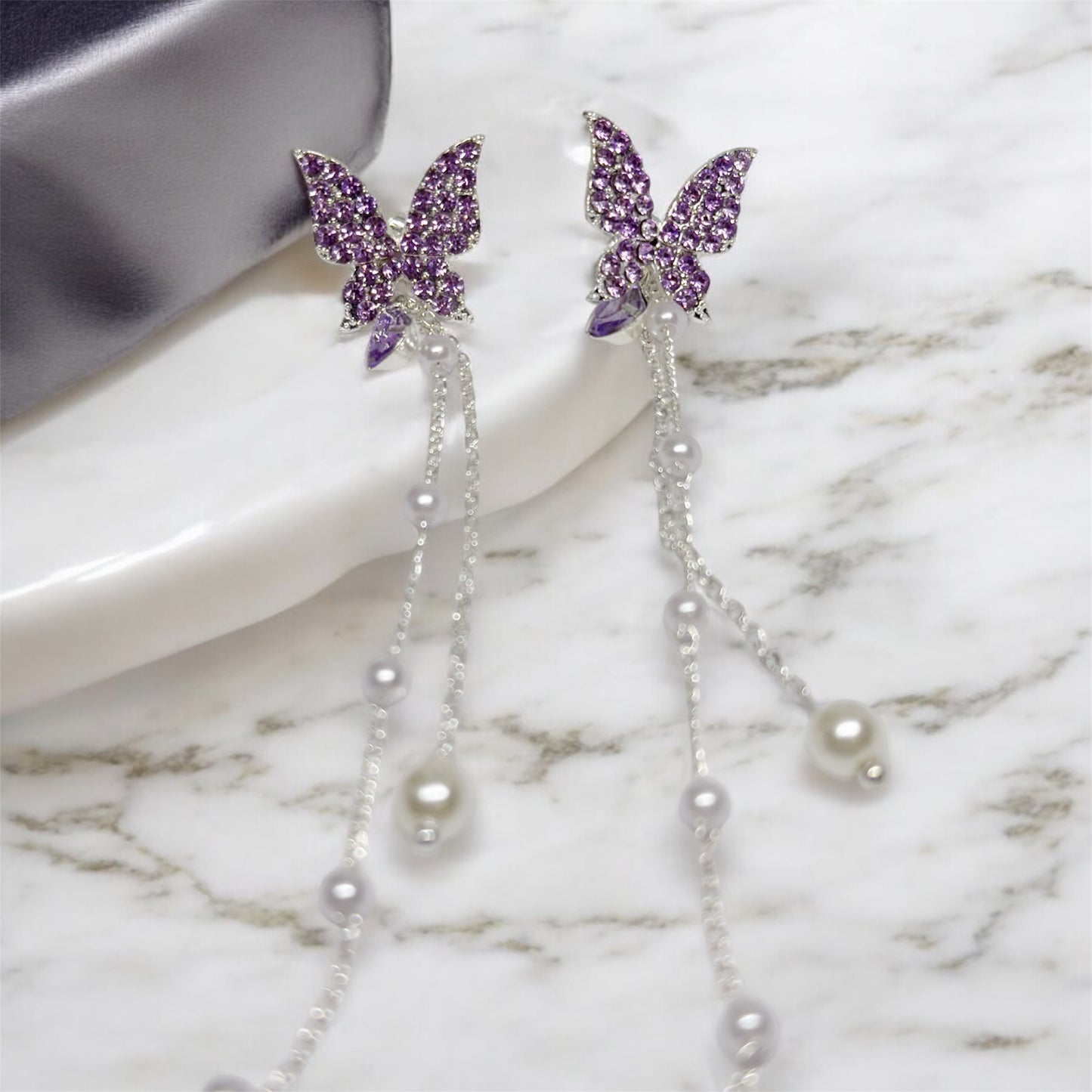 Purple rhinestone butterfly earrings