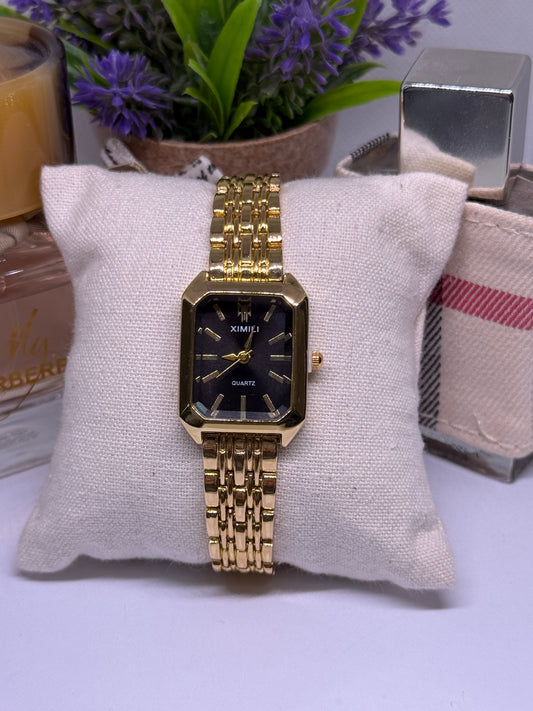 Golden tone women watch - black