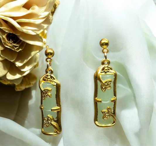 Bamboo style golden earrings