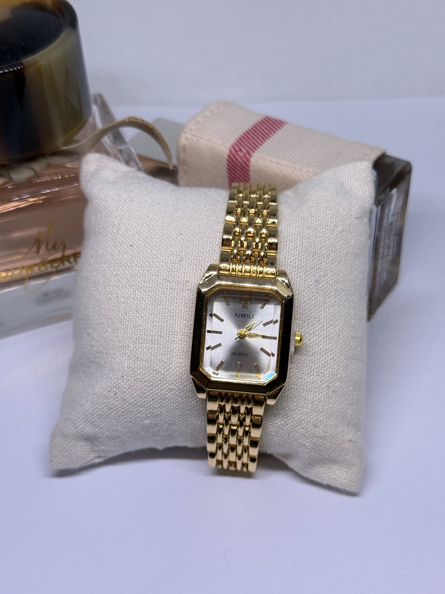 Golden tone women watch - white
