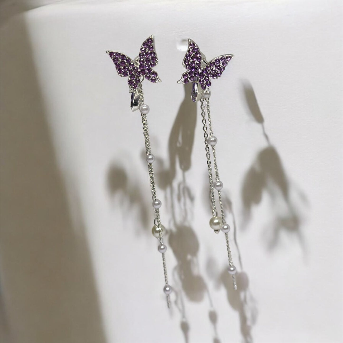 Purple rhinestone butterfly earrings