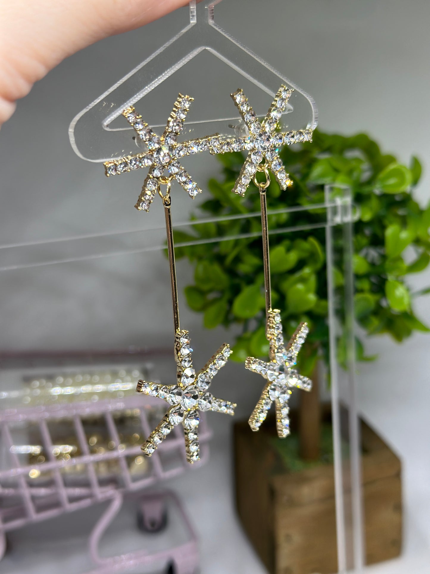 Gold glittering starburst earrings| silver stars diamante dangle earrings | Celestial snowflakes drop earrings | swing Christmas earrings