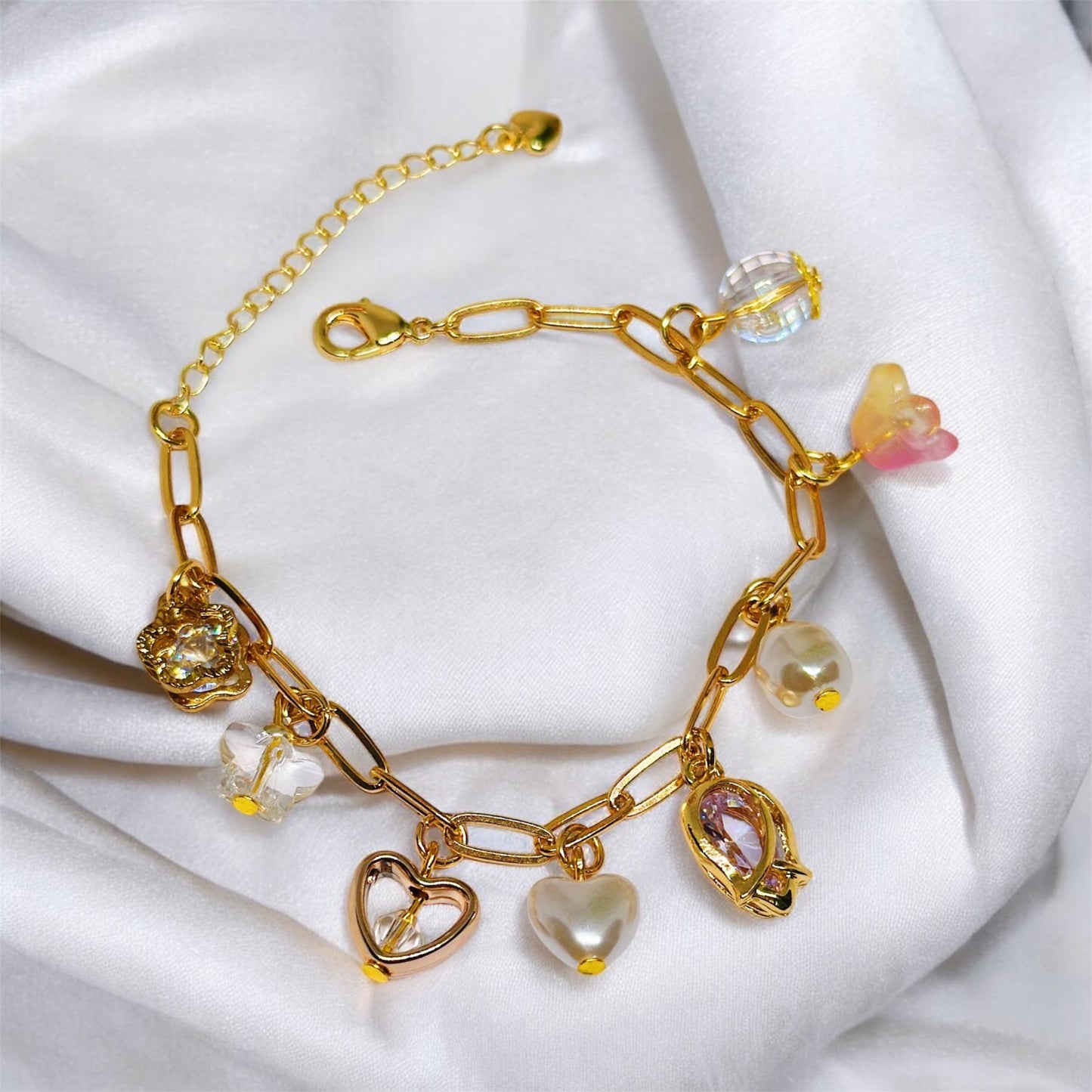 Golden chain bracelets with pearls and flower beads