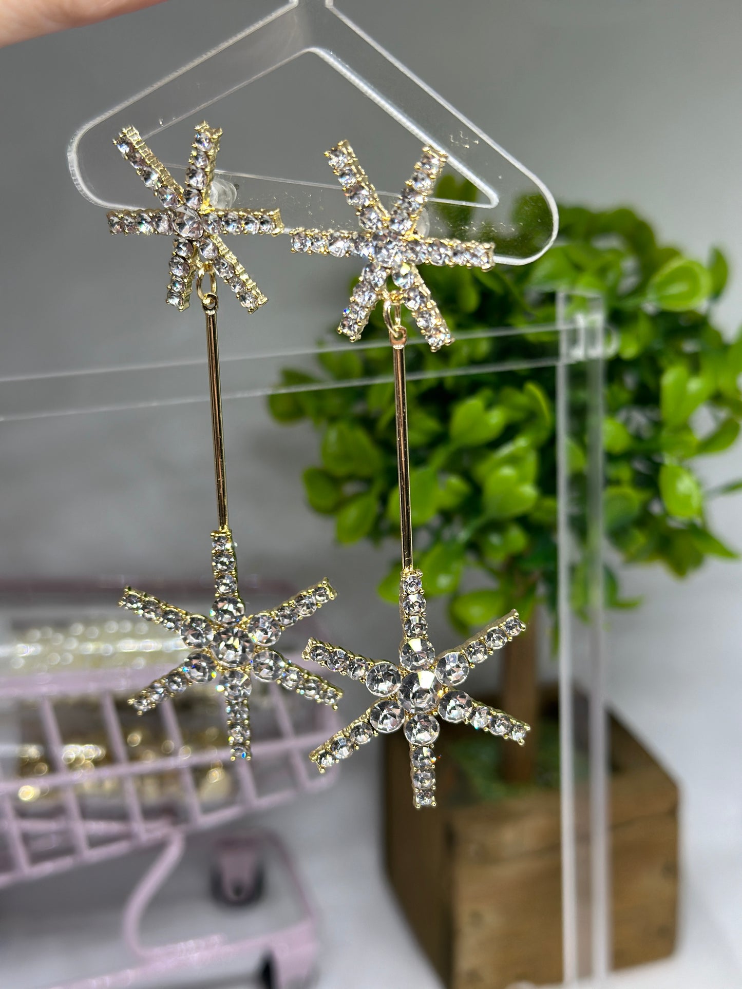 Gold glittering starburst earrings| silver stars diamante dangle earrings | Celestial snowflakes drop earrings | swing Christmas earrings