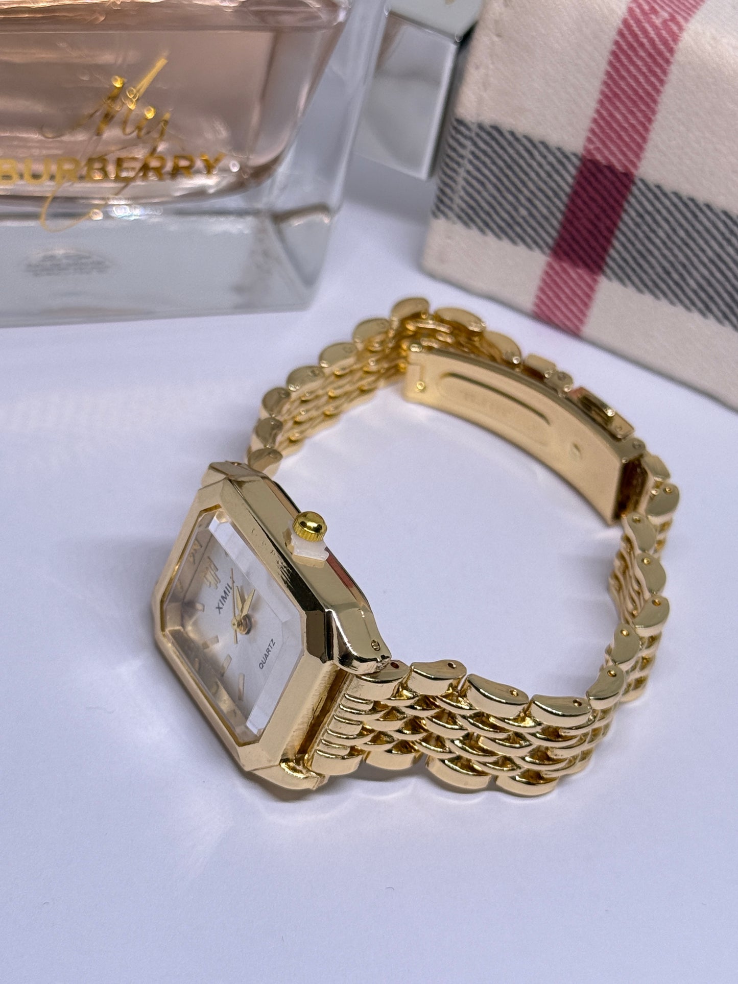 Golden tone women watch - white