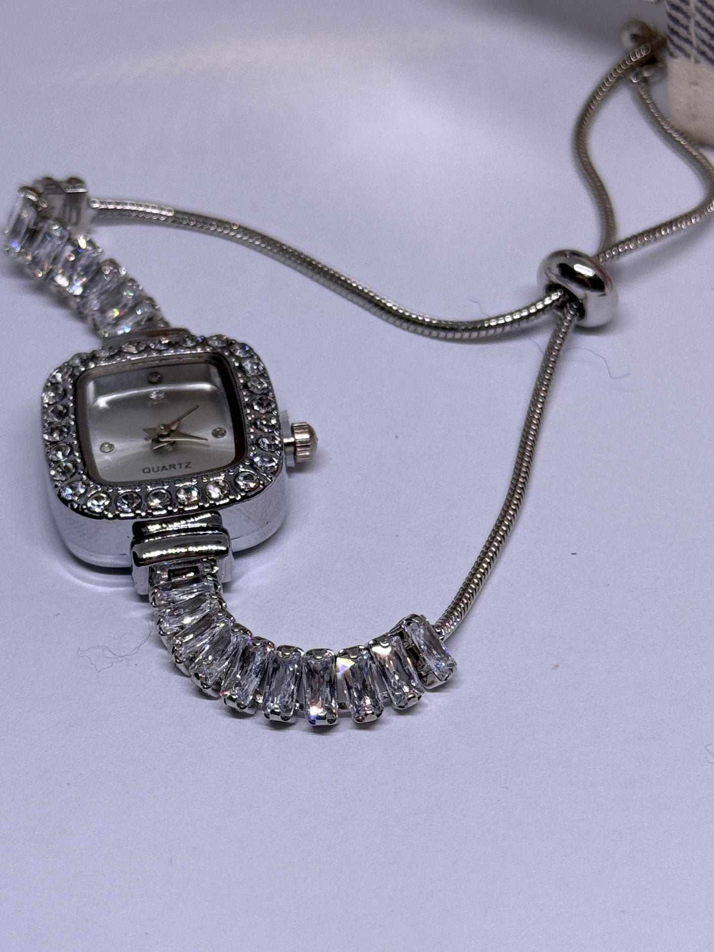 Silver tone rhinestone bracelet watch