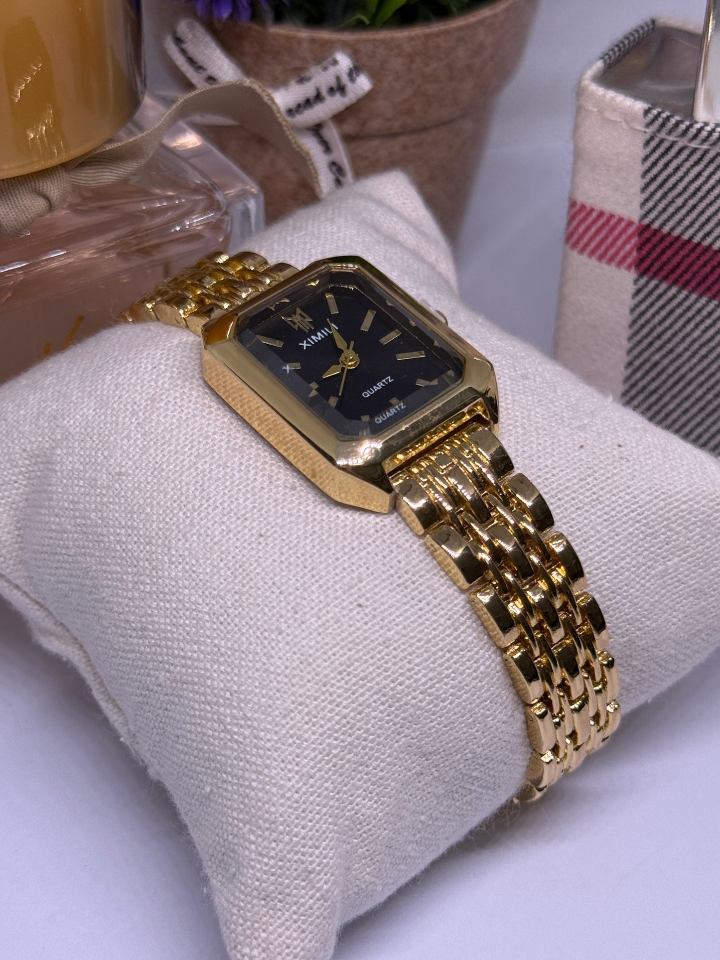 Golden tone women watch - black