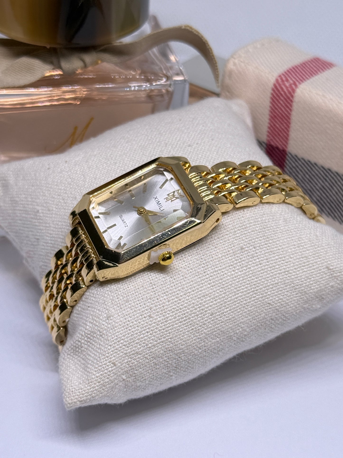 Golden tone women watch - white