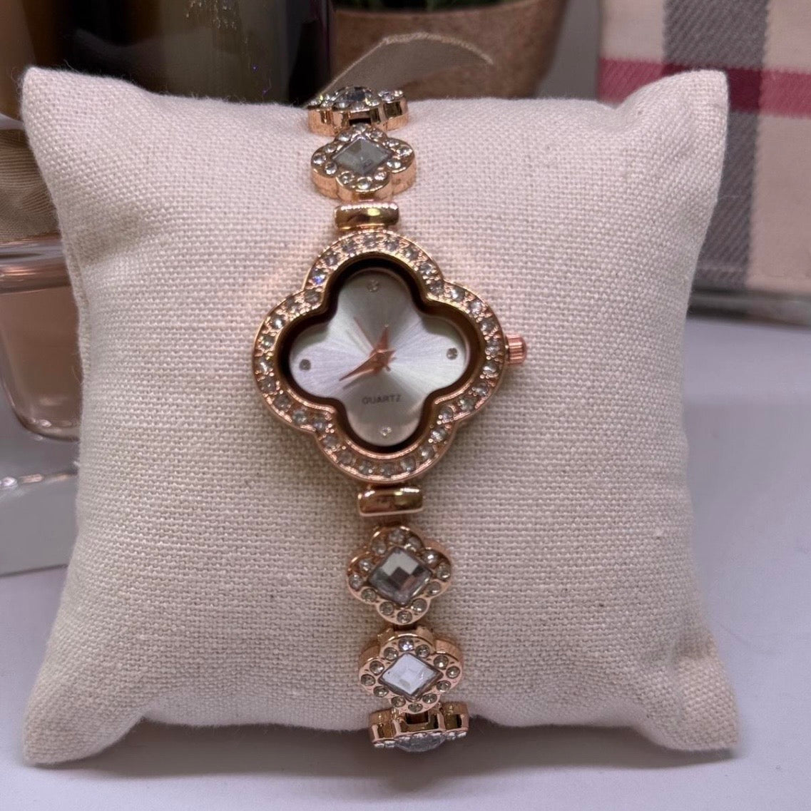 Golden clover shaped watch with clear rhinestone