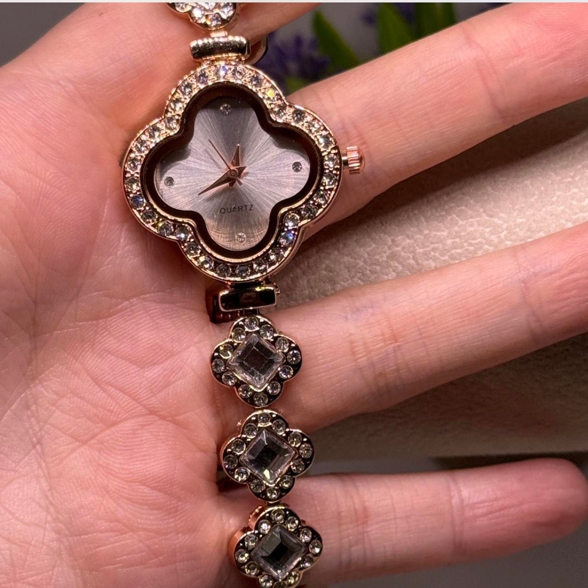 Golden clover shaped watch with clear rhinestone