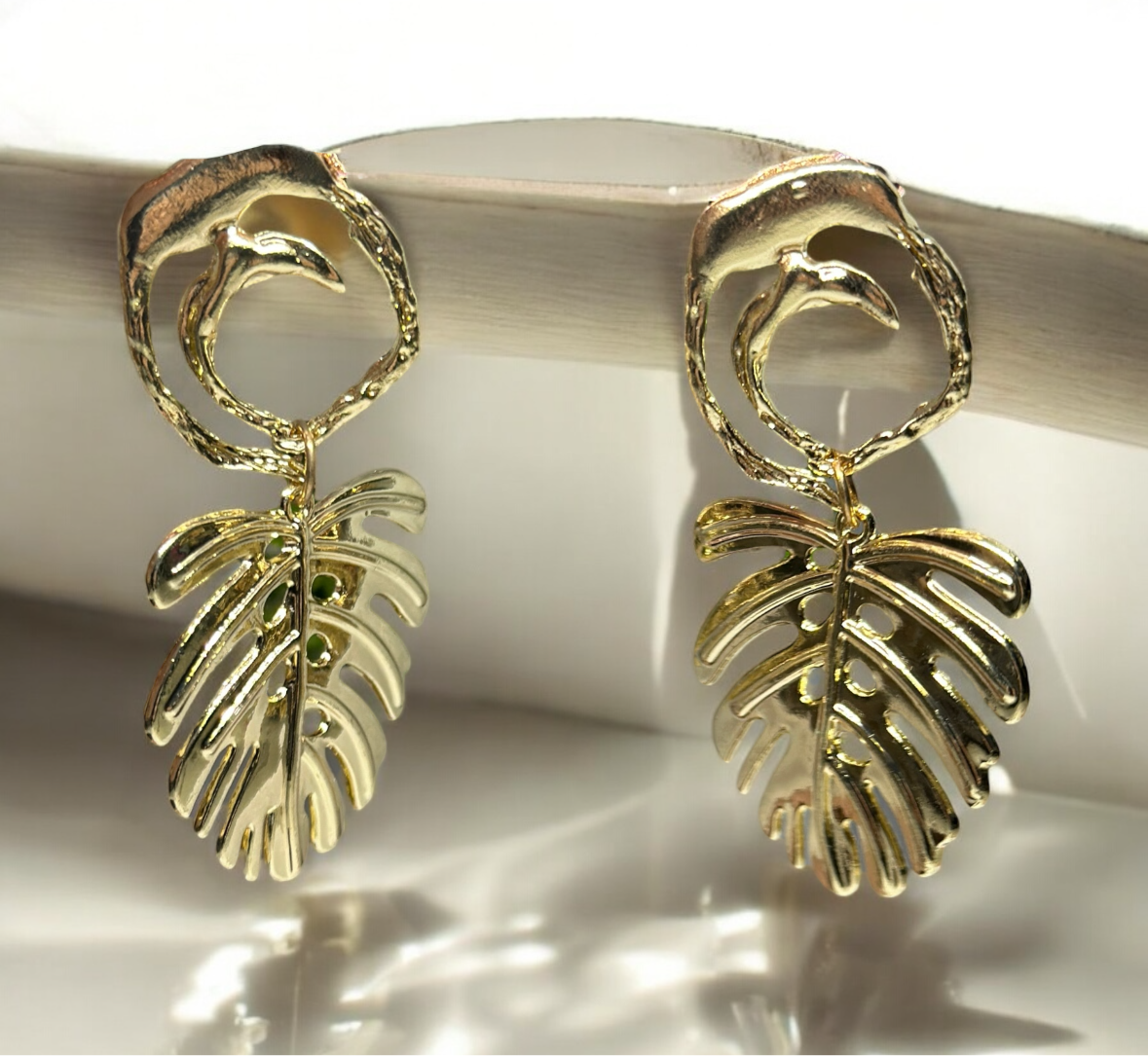 Golden monstera leaf earrings