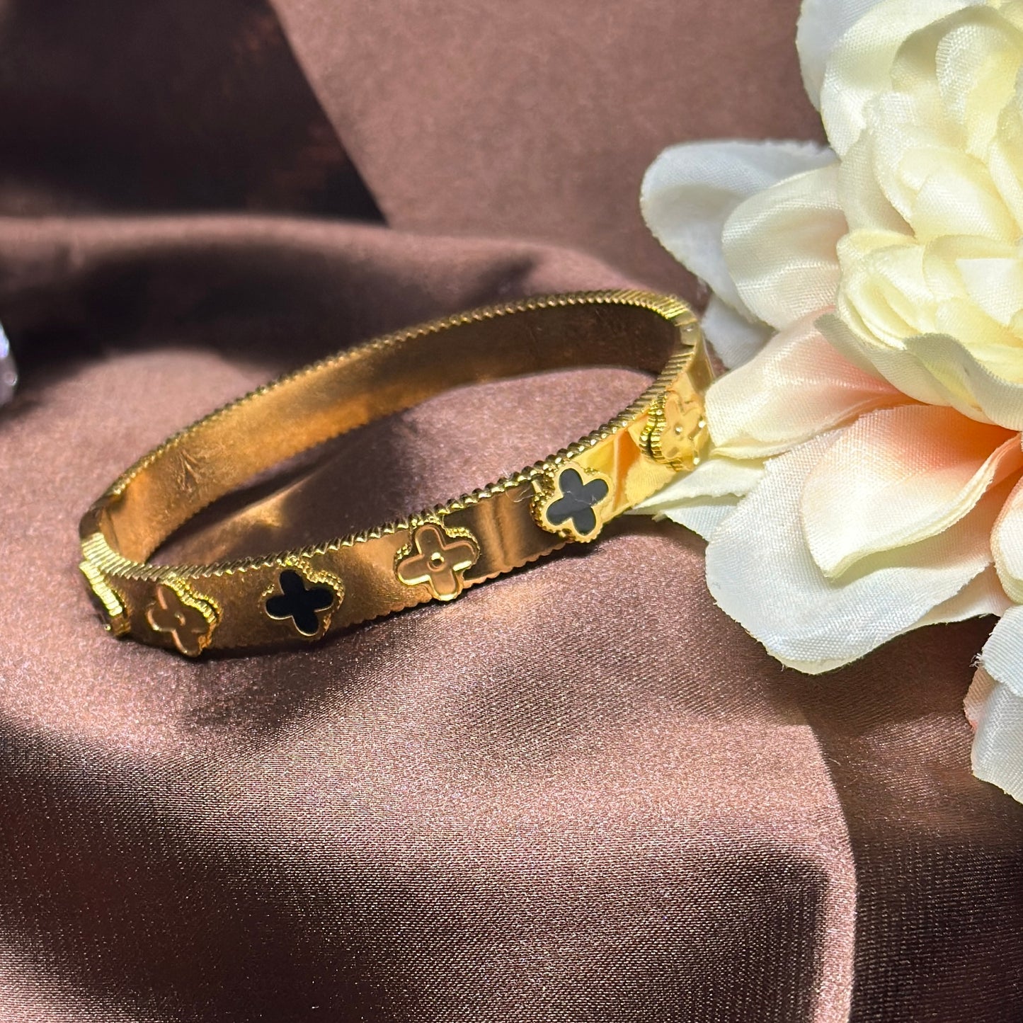 Gold bangle with black clover pattern | rhinestones embossed