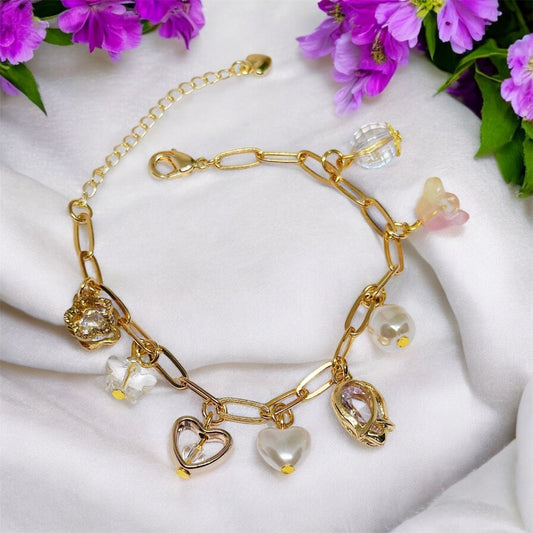 Golden chain bracelets with pearls and flower beads