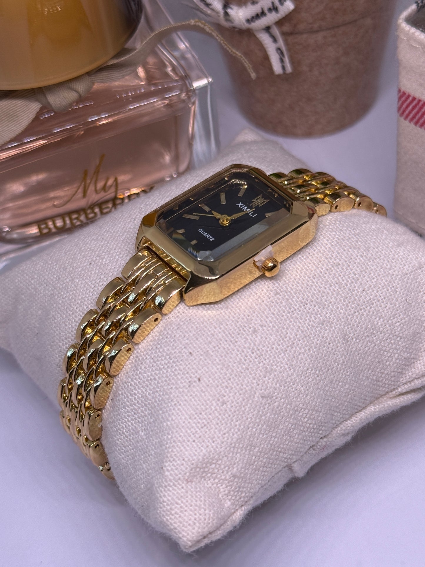 Golden tone women watch - black