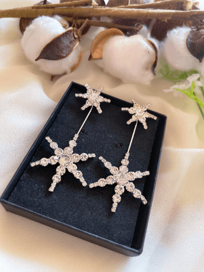 Gold glittering starburst earrings| silver stars diamante dangle earrings | Celestial snowflakes drop earrings | swing Christmas earrings - TuttyKnitty