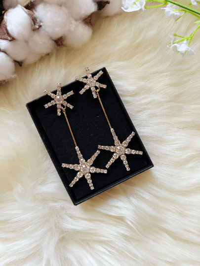 Gold glittering starburst earrings| silver stars diamante dangle earrings | Celestial snowflakes drop earrings | swing Christmas earrings - TuttyKnitty