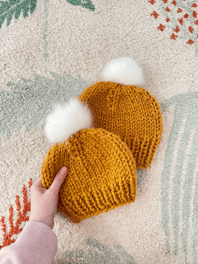 Hand knit baby beanie | Baby Chunky Double Pom Pom Beanie in Mustard | Newborn Baby Toddler hat | Fur Pom Pom Hat | Knit winter hat - TuttyKnitty