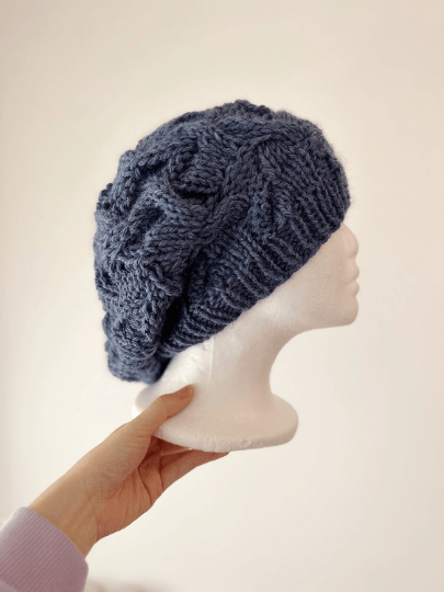 Alpaca blend cable slouchy beanie in navy blue